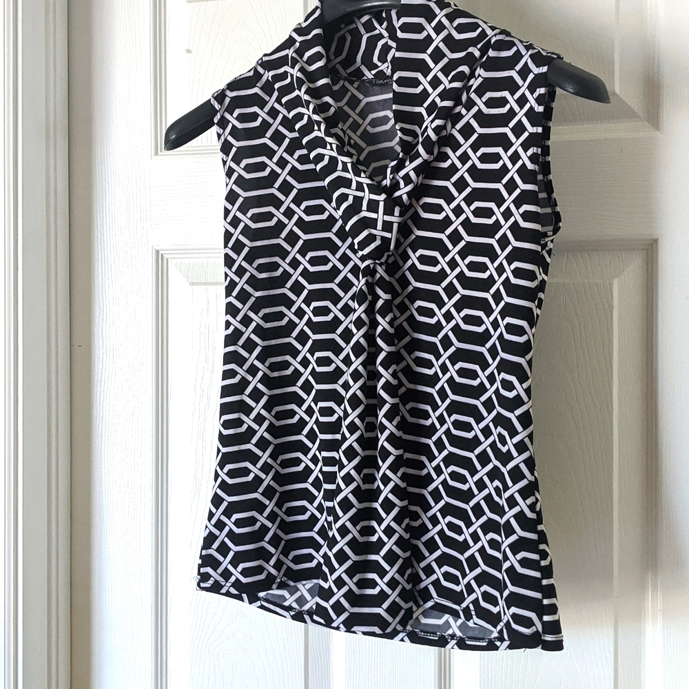 Sleeveless top tie detail on front.